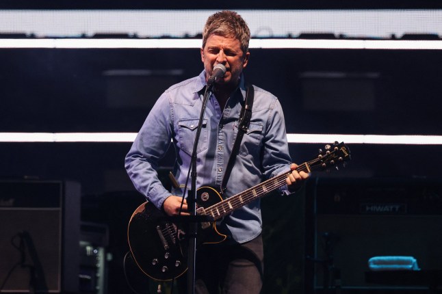 Noel Gallagher of Oasis performs, during the first of their sellout comeback shows, at the Cardiff Principality Stadium, in Cardiff, Wales, Britain, July 4, 2025. REUTERS/Suzanne Plunkett NO RESALES. NO ARCHIVES. NO USE AFTER 365 DAYS AFTER PUBLICATION. PHOTOGRAPHS MAY BE PUBLISHED IN CONTEXT WITH THE SHOW ONLY.