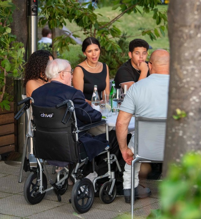 BGUK_3295080 - *PREMIUM-EXCLUSIVE* London, UNITED KINGDOM MUST CALL FOR PRICING BEFORE USAGE - Hollywood legends Michael Caine and Vin Diesel dined together with their families at the River Caf?? in Hammersmith, London, for an early birthday celebration - all captured as part of an upcoming documentary. Caine, 92, was pictured for the first time since transitioning from a Zimmer frame to a wheelchair and appeared in high spirits as Vin lovingly wheeled him around. The legendary actor, who sported a band-aid on his face, was joined by his wife Shakira, while Vin???s long-time partner Paloma Jim??nez and their two children were also present. Caine, who considers Vin his ???unofficial son,??? looked to be thoroughly enjoying himself during the two-hour meal, even singing Happy Birthday to the Fast & Furious star, who turns 58 next week. After the feast, Vin was seen rubbing his belly, clearly satisfied with the hearty celebration as this comes all ahead of Vin's jury trial for Sexual Battery starting next month August 18th with the Hollywood star's rep claimed there have been no cases against the actor for sexual misconduct or assault allegations, according to reports. *STRICTLY NO SUBSCRIPTIONS AND NO SOCIAL SOCIAL MEDIA USE* Pictured: Michael Caine, Vin Diesel, Shakira Caine, Paloma Jim??nez BACKGRID UK 9 JULY 2025 UK: +44 208 344 2007 / uksales@backgrid.com USA: +1 310 798 9111 / usasales@backgrid.com *Pictures Containing Children Please Pixelate Face Prior To Publication*