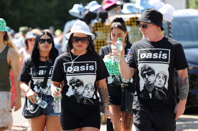 Oasis fans wear T-shirts featuring an image of Liam and Noel Gallagher, ahead of Oasis' hometown reunion show at Heaton Park, in Manchester, Britain, July 11, 2025. REUTERS/Temilade Adelaja