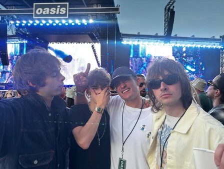 Orlando Bloom with the Oasis kids at the band's gig in Manchester