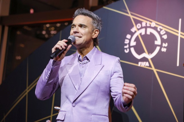 NEW YORK, NEW YORK - JANUARY 16: Robbie Williams performs during the FIFA Club World Cup Trophy Presentation at Tiffany & Co on January 16, 2025 in New York City. (Photo by Ira L. Black - FIFA/FIFA via Getty Images)