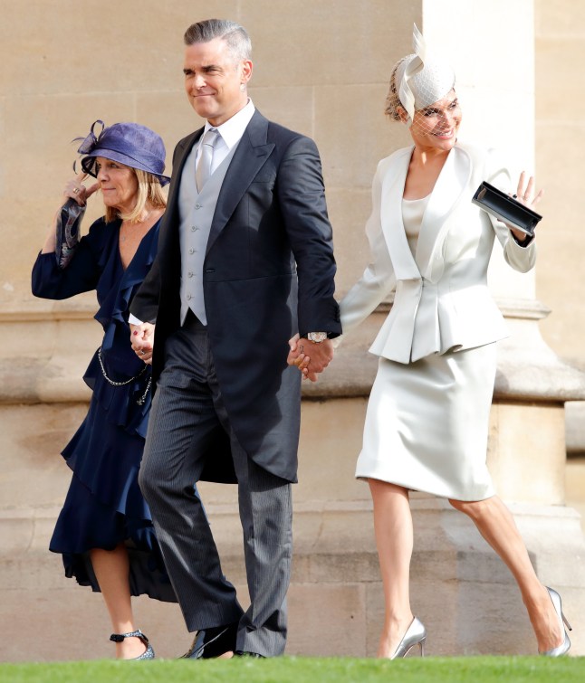 WINDSOR, UNITED KINGDOM - OCTOBER 12: (EMBARGOED FOR PUBLICATION IN UK NEWSPAPERS UNTIL 24 HOURS AFTER CREATE DATE AND TIME) Gwen Field, Robbie Williams and Ayda Field attend the wedding of Princess Eugenie of York and Jack Brooksbank at St George's Chapel on October 12, 2018 in Windsor, England. (Photo by Max Mumby/Indigo/Getty Images)
