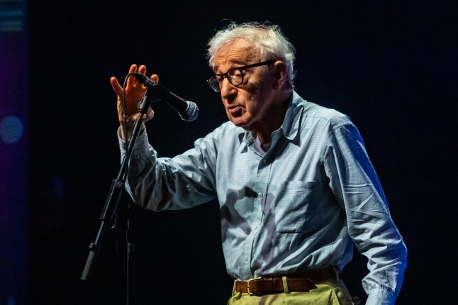 Woody Allen at a microphone