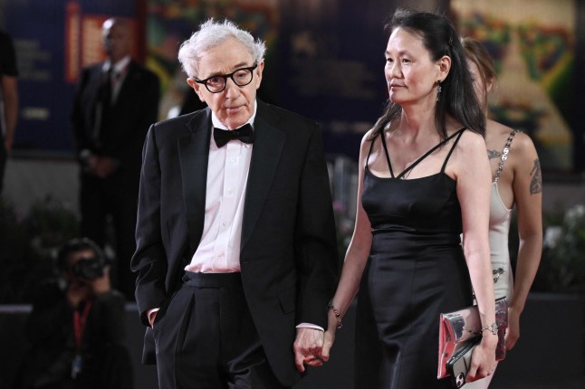 US director Woody Allen (L) and Soon-Yi Previn attend the red carpet of the movie "Coup de Chance" presented out of competition at the 80th Venice Film Festival on September 4, 2023 at Venice Lido. (Photo by Tiziana FABI / AFP) (Photo by TIZIANA FABI/AFP via Getty Images)