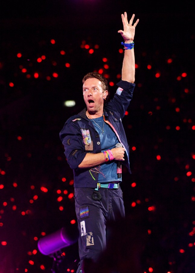 LONDON, ENGLAND - AUGUST 22: (EDITORIAL USE ONLY) Chris Martin of Coldplay performs during the 'Music Of The Spheres World Tour' at Wembley Stadium on August 22, 2025 in London, England. Coldplay will perform ten shows at Wembley Stadium during August & September, bringing to a close the most-attended concert tour in history, watched by over 12 million fans across 43 countries. (Photo by Jim Dyson/Getty Images)