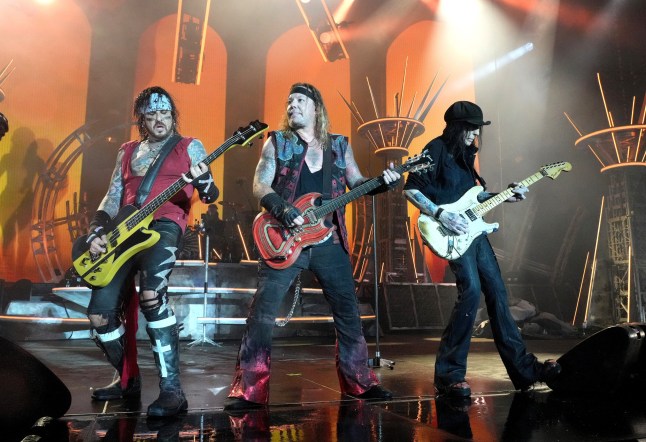 WASHINGTON, DC - JUNE 22: Nikki Sixx, Vince Neil and Mick Mars of M??tley Cr??e perform onstage during The Stadium Tour at Nationals Park on June 22, 2022 in Washington, DC. (Photo by Kevin Mazur/Getty Images for Live Nation)
