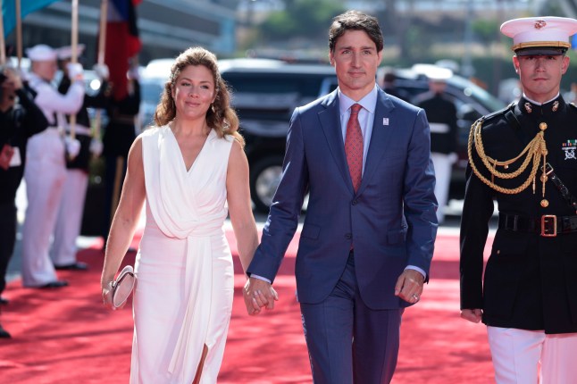 LOS ANGELES, CALIFORNIA - JUNE 08: Prime Minister Justin Trudeau of Canada arrives alongside his wife Sophie Gregoire Trudeau to the Microsoft Theater for the opening ceremonies of the IX Summit of the Americas on June 08, 2022 in Los Angeles, California. Leaders from North, Central and South America will travel to Los Angeles for the summit to discuss issues such as trade and migration. The United States is hosting the summit for the first time since 1994, when it took place in Miami. (Photo by Anna Moneymaker/Getty Images)