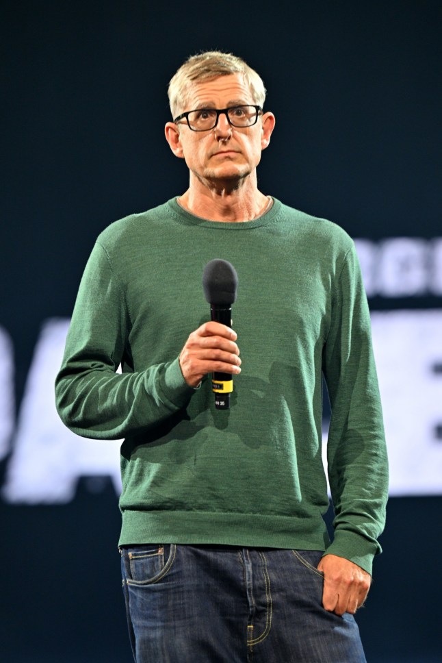 LONDON, ENGLAND - SEPTEMBER 17: Louis Theroux speak onstage during the Together For Palestine concert at Wembley Arena on September 17, 2025 in London, England. (Photo by Samir Hussein/WireImage for ABA)