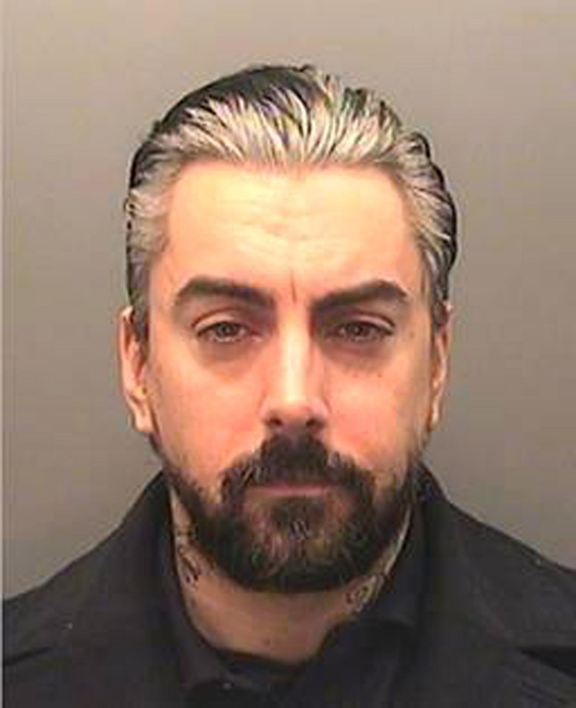 A mugshot of Ian Watkins