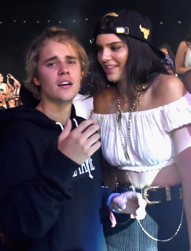 INDIO, CA - APRIL 11: EXCLUSIVE COVERAGE - Singer Justin Bieber (L) and model Kendall Jenner in the audience during day 2 of the 2015 Coachella Valley Music & Arts Festival (Weekend 1) at the Empire Polo Club on April 11, 2015 in Indio, California. (Photo by Jeff Kravitz/FilmMagic)