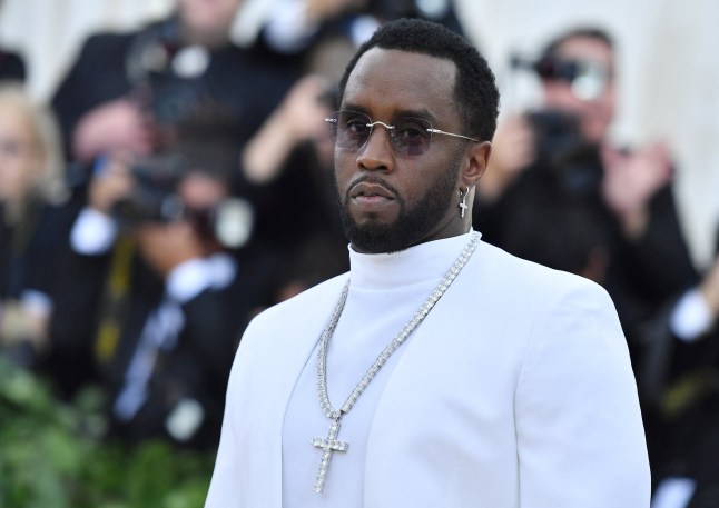 (FILES) Sean Combs 'P. Diddy' arrives for the 2018 Met Gala on May 7, 2018, at the Metropolitan Museum of Art in New York. Sean Combs once had it all: riches, fame and the power to get anything he wanted. But he's sat behind bars for more than a year. And on October 3, a judge told him he'll stay there for several more. For the first time Combs spoke to the court directly, telling the judge who would sentence him to more than four years in prison for prostitution-related crimes that he's been "humbled and broken to my core." (Photo by ANGELA WEISS / AFP) (Photo by ANGELA WEISS/AFP via Getty Images)