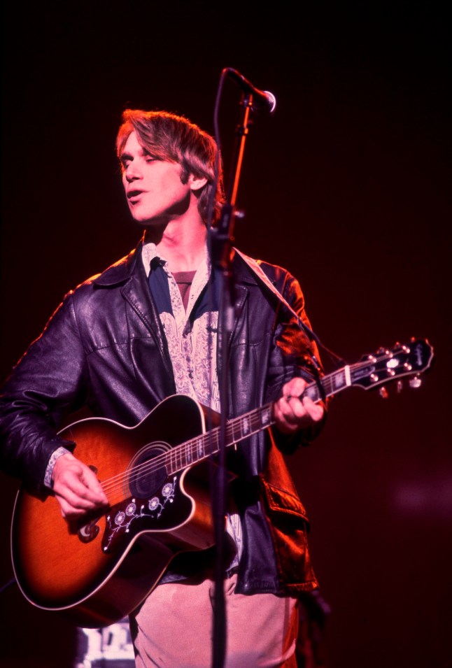 American Folk musician Todd Snider plays guitar as he performs onstage at Medinah Temple, Chicago, Illinois, November 27, 1997. (Photo by Paul Natkin/Getty Images)