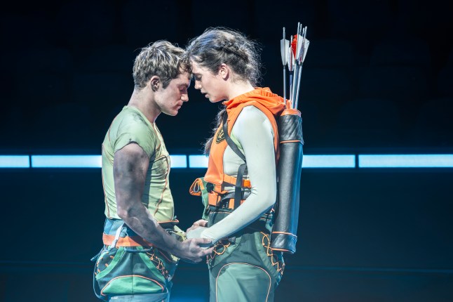 Embargoed until Weds 5 Nov at 10am HungerGamesOnStage, Euan Garrett (Peeta Mellark), Mia Carragher (Katniss Everdeen) ®, ™ & © 2025 Lions Gate Entertainment Inc. All Rights Reserved Credit: Johan Persson