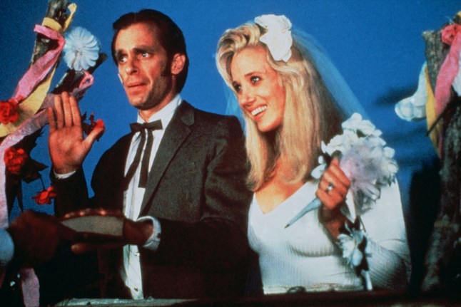 Editorial use only. No book cover usage. Mandatory Credit: Photo by Avenue/Kobal/Shutterstock (5878847a) Keith Carradine, Sally Kirkland Cold Feet - 1989 Director: Robert Dornhelm Avenue Pictures USA Scene Still Comedy