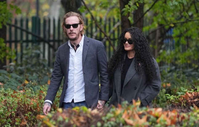 Former GB News presenter Laurence Fox and his partner Elizabeth Barker arrive at Woolwich Crown Court in London, where he has been charged under section 66A of the Sexual Offences Act 2003 after allegedly sharing a compromising photo of Narinder Kaur on social media. Picture date: Friday November 14, 2025. PA Photo. Photo credit should read: Yui Mok/PA Wire