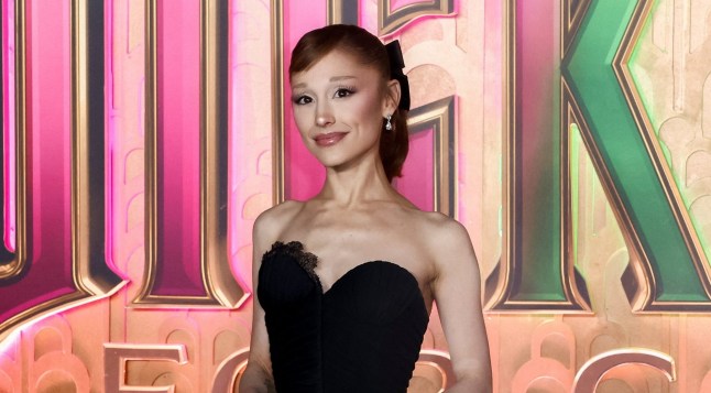 Ariana Grande smiles in a strapless dress at the Wicked: For Good premiere