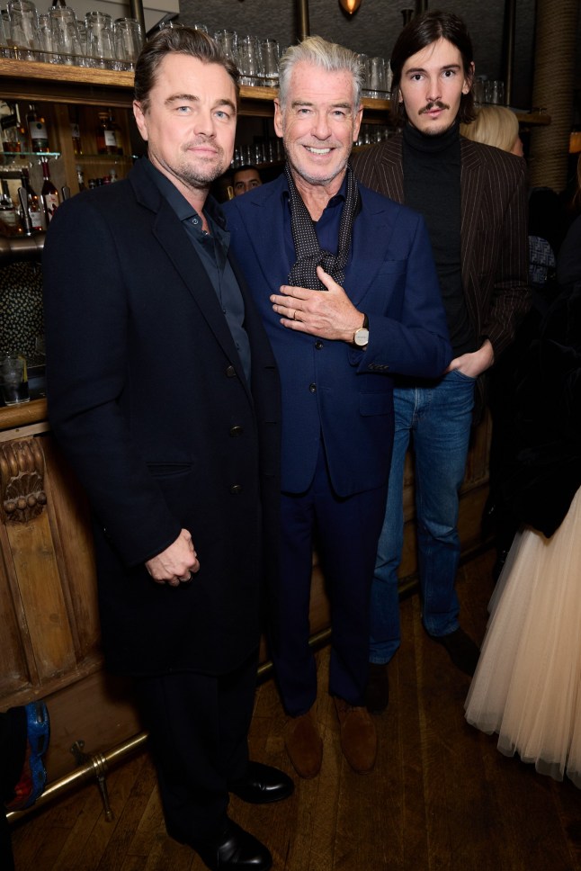 LONDON, ENGLAND - NOVEMBER 20: (L-R) Leonardo DiCaprio, Pierce Brosnan and Dylan Brosnan attend a celebration of One Battle After Another with Paul Thomas Anderson and Leonardo DiCaprio at The Hart Pub, London on November 20, 2025 in London, England. (Photo by Darren Gerrish/WireImage for Warner Bros Pictures)